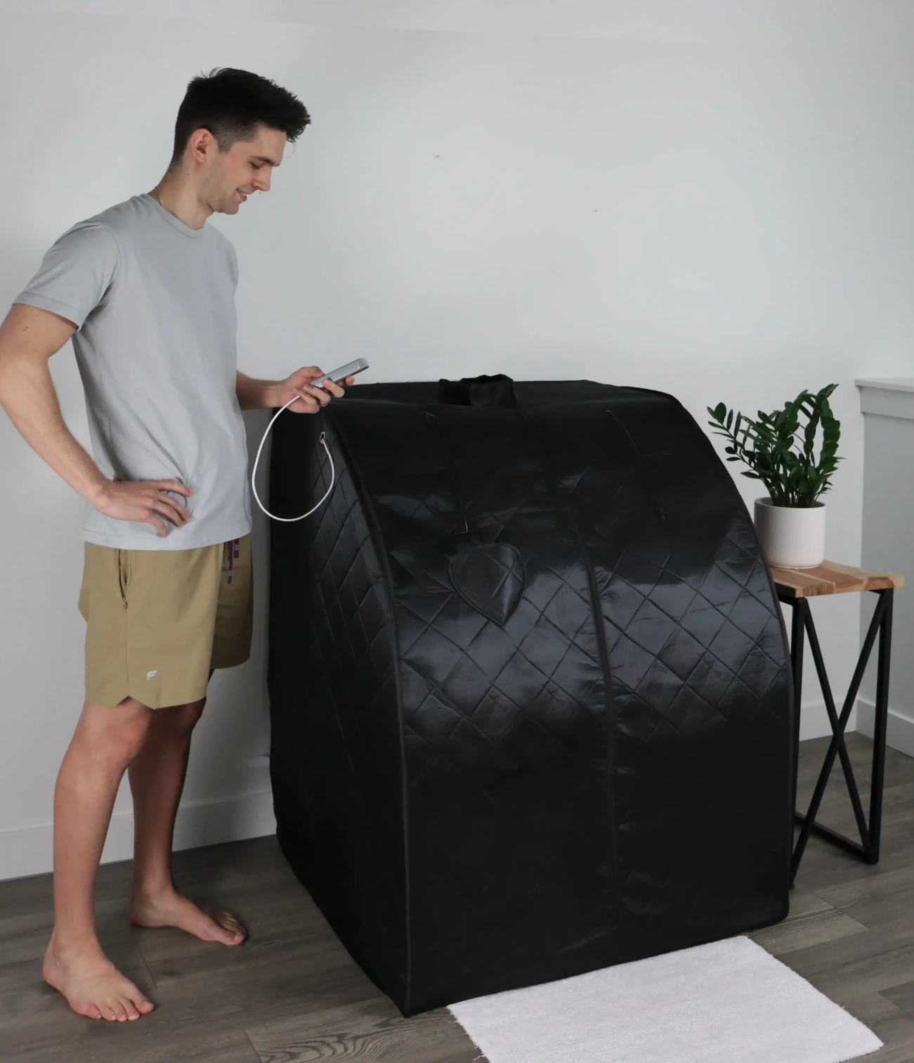 man using ultralux foldaway sauna