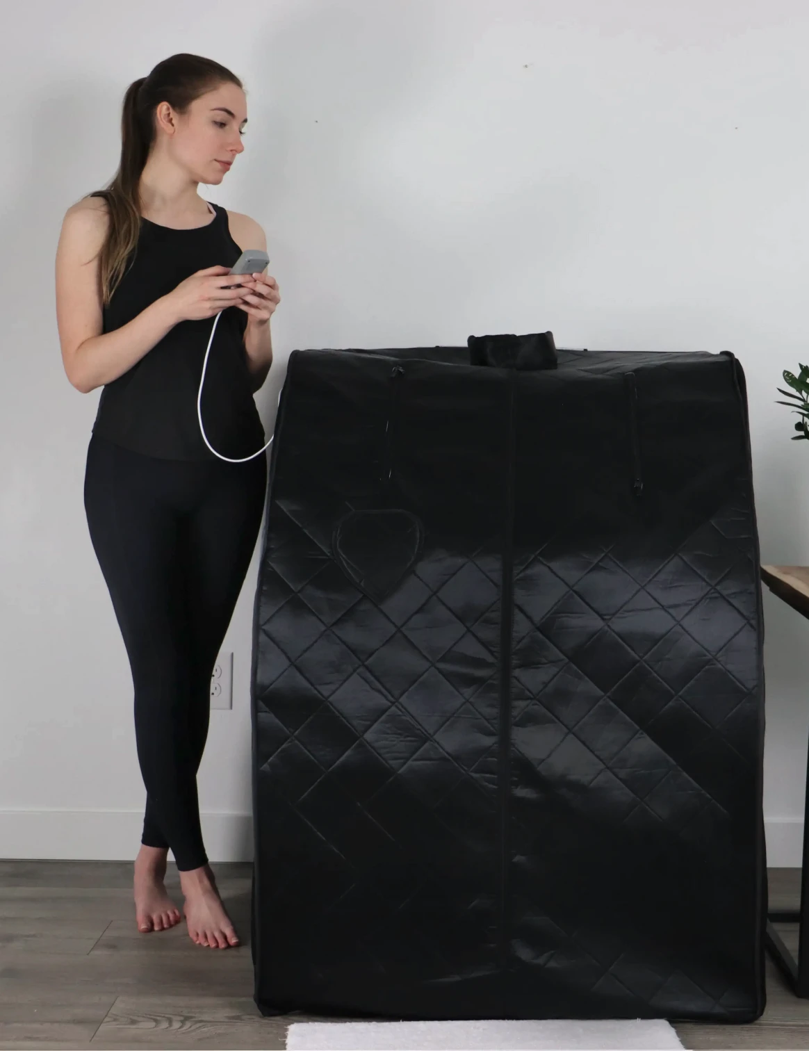 ultralux foldaway next to woman