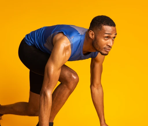 black-athlete-sprinting-up-stairs-excercising