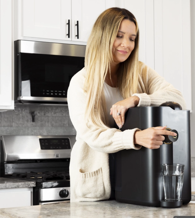 woman next to closed foldaway sauna