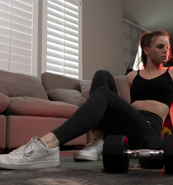 woman next to closed foldaway sauna